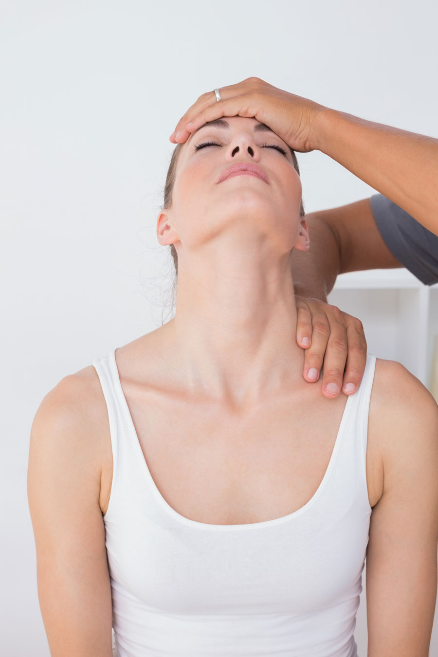 Woman Receiving Treatment for Neck Pain