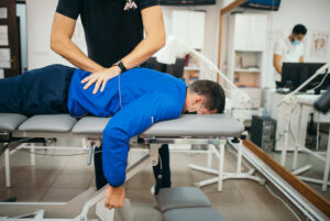 image of man on chiropractic table